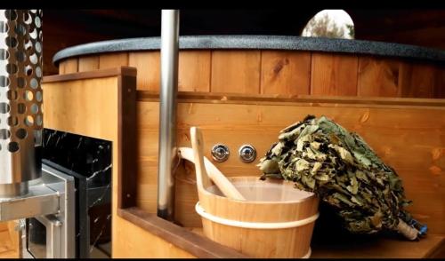 a small kitchen with a bucket and a stove at 1929 Wine Food Relax Agriturismo in Acqui Terme