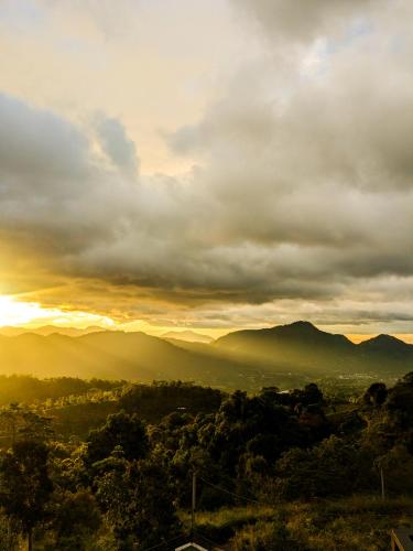 a view of the mountains in the sunset at The Aurelia in Gampola