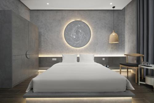 Postel nebo postele na pokoji v ubytování Jacayl Hotel - Hà Đông