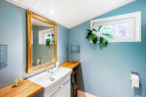 A bathroom at Cozy witchs House With Fjord View