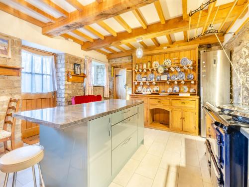 a kitchen with a large island in a room at Carnau Bach uk45822 in Llandegley