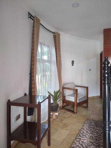 Postel nebo postele na pokoji v ubytování Sprunger Avenue - tulia homes