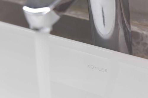 a white counter top with a toaster on it at QiPan Holiday hotel Lugu Lake in Ninglang