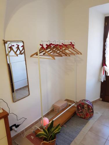 a room with a mirror and a dressing table at La Tana degli Orsetti in Barrea