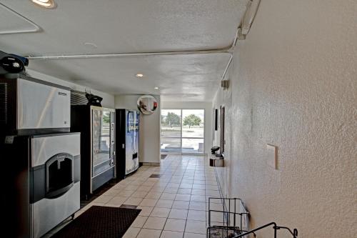 a hallway of a house with a room with at Econo Lodge Midvale in Midvale