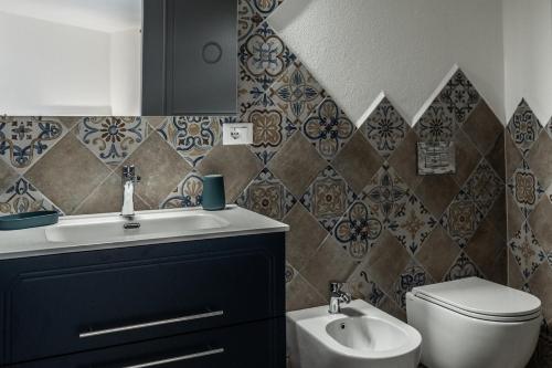 Ein Badezimmer in der Unterkunft Domo Orise Alloggio in pieno centro