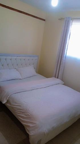 Krevet ili kreveti u jedinici u okviru objekta Carley's comfort home