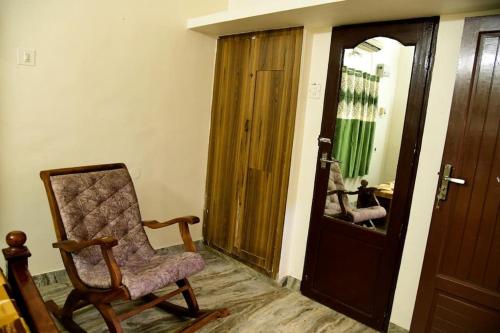 Ruang duduk di Spacious Guesthouse in Nagercoil