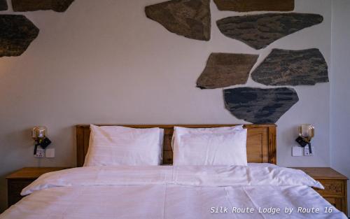 Postel nebo postele na pokoji v ubytování Silk Route Lodge - Hunza
