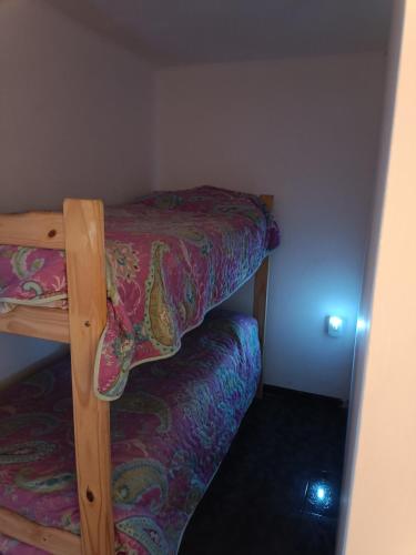 Poschodová posteľ alebo postele v izbe v ubytovaní Encantados