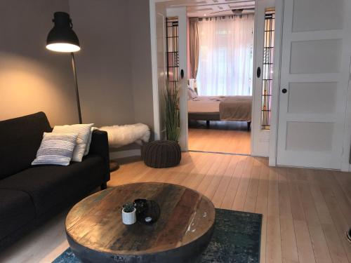 En eller flere senge i et værelse på Stijlvolle benedenwoning Singel