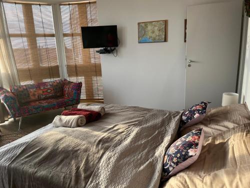 Posteľ alebo postele v izbe v ubytovaní Cédrus apartman