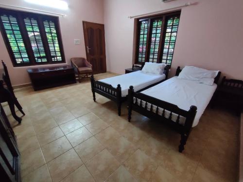 Φωτογραφία από το άλμπουμ του Ashtamudi Homes σε Kollam