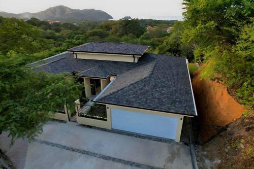 an overhead view of a house with a roof at Casa Mon Coeur-Playa Del Coco Ocean View in Coco