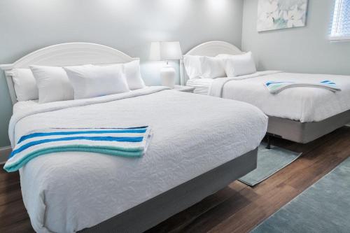 Ένα ή περισσότερα κρεβάτια σε δωμάτιο στο Spectacular Views & Comfortable Oceanfront 2 Bdrm