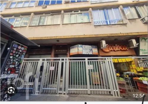 a building with a gate in front of a store at Vista para o mar Copacabana in Rio de Janeiro