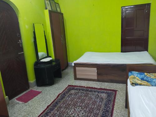 Postel nebo postele na pokoji v ubytování Aleyahome stay