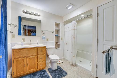 a bathroom with a toilet and a shower at Pet-Friendly Franklinville Farmhouse with Sunroom! 