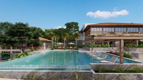 una imagen de una piscina en un complejo en Hotel Quinta de Santa Bárbara Eco Resort, en Pirenópolis