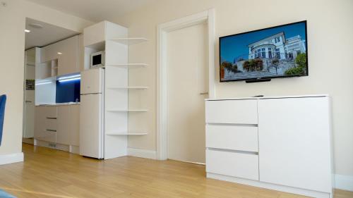 TV a/nebo společenská místnost v ubytování Lux Apart Hotel 555