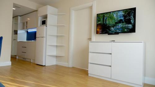 TV a/nebo společenská místnost v ubytování Lux Apart Hotel 555