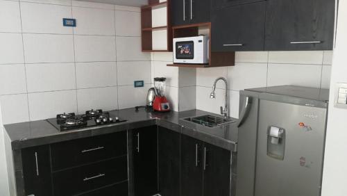 Kuchyň nebo kuchyňský kout v ubytování Apartamento Ideal - Cusco