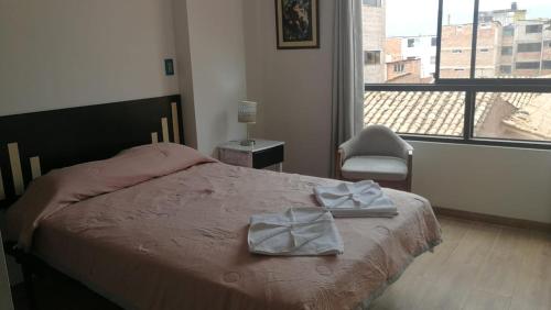 Postel nebo postele na pokoji v ubytování Apartamento Ideal - Cusco