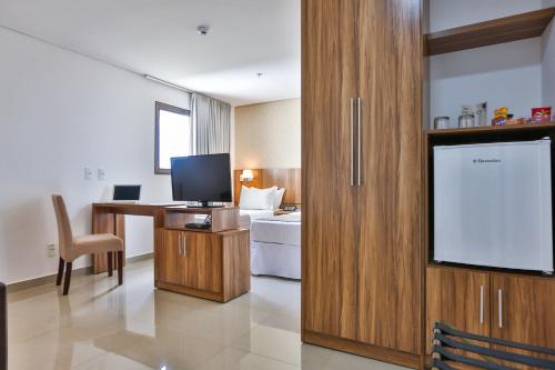 Η κουζίνα ή μικρή κουζίνα στο MG Flats & Residence