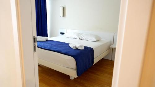 Postel nebo postele na pokoji v ubytování Lux Apart Hotel 555