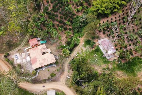 an aerial view of a house with a yard at Finca Sierra Luz in Jericó