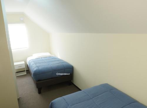 Zimmer mit 2 Betten in einem Zimmer in der Unterkunft Casa completa 3D 2B, amplia comoda y equipada in Talca