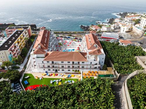 an aerial view of the hotel and the ocean at Sholeo Lodges Los Gigantes in Puerto de Santiago