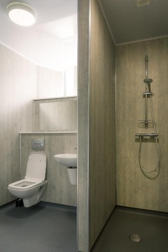 a bathroom with a toilet and a sink at Princes Street Hostel in Edinburgh