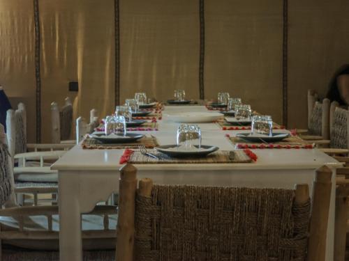 A restaurant or other place to eat at The Luxury ERG Safari Camp