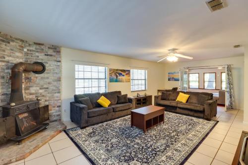 a living room with two couches and a fireplace at Lake Days and Golf Outings Summerfield Group Escape in Summerfield