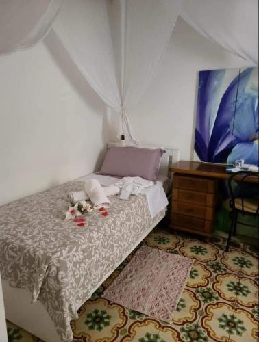 Postel nebo postele na pokoji v ubytování Corto Maltese