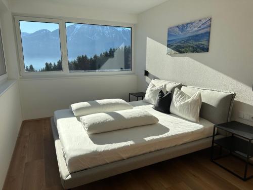 Кровать или кровати в номере Apartment Bloserberg