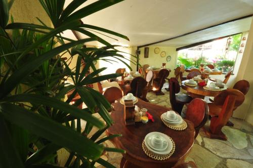 Et opholdsområde på Pousada Recanto da Coruja