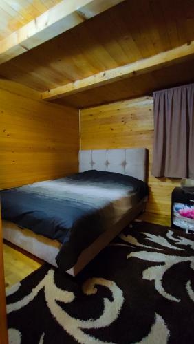 Giường trong phòng chung tại Holiday Home Snow Queen
