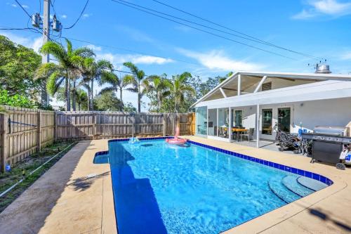 a swimming pool in the backyard of a house at Our favorite place in Naples