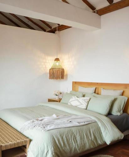 En eller flere senge i et værelse på casa colonial