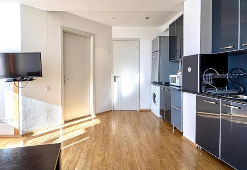Kuchyň nebo kuchyňský kout v ubytování 3-room apartment NFT Gudauri Penta 301