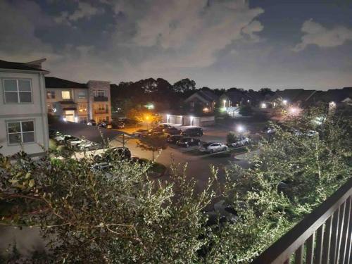 a view of a parking lot at night at Home at Energy corridor in Houston