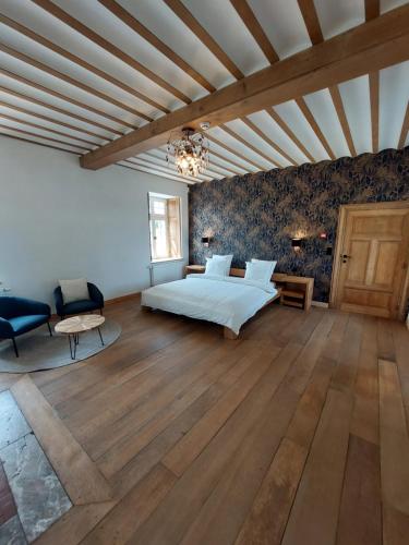 Postel nebo postele na pokoji v ubytování La Ferme de Sotrez