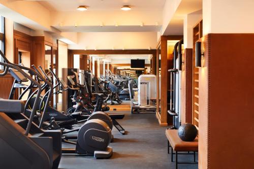 a gym filled with lots of treadmills and machines at Shinola Hotel in Detroit