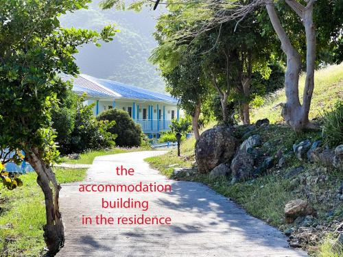 the accommodation building in the resistance sign in front of a house at Top floor unit 520 ft2 - 48 m2 with stunning dominant view on ocean, St Barth, Orient Bay in Cul de Sac