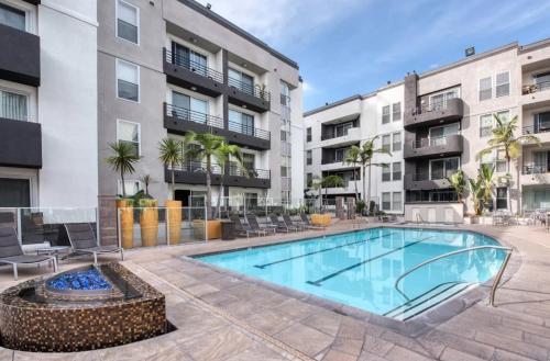 an image of a swimming pool in a apartment complex at Gorgeous 2bdr Home in Marina in Los Angeles