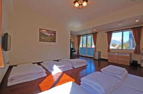 Una cama o camas en una habitación de Ti Siang B&B