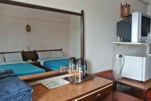 Η κουζίνα ή μικρή κουζίνα στο Anodard Hotel Chiang Mai