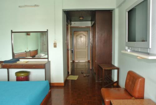 Ένα ή περισσότερα κρεβάτια σε δωμάτιο στο Anodard Hotel Chiang Mai